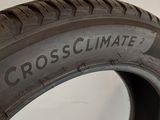 a close up of a tire with the word cross climate written on it