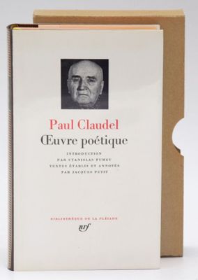 the book is open to a picture of a man in a suit and tie
