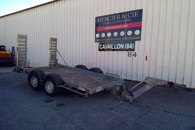 an image of a trailer parked in front of a building