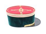 a red and green box with a gold trim