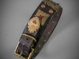 an image of a brown leather bracelet with a gold buckle