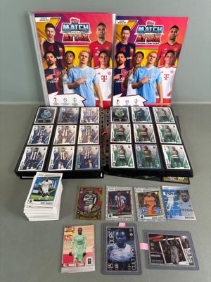 a group of cards and dvds sitting on top of a table