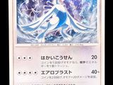 a close up of a card with a picture of a woman in a blue dress