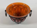a brown bowl with a handle on a white background