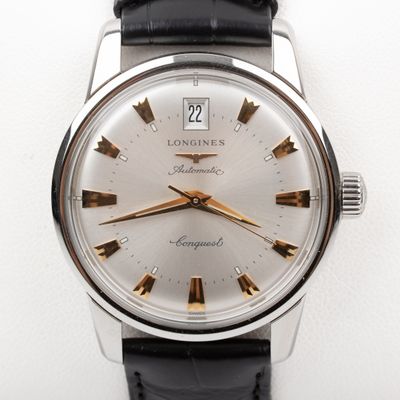 an image of a longines watch with a silver dial and black leather strap