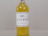 a bottle of wine that is sitting on a table