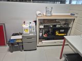 an image of a kitchen with a refrigerator and other items