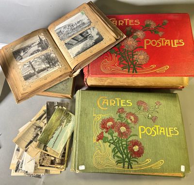 several old books are stacked on top of each other on a table