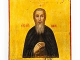 a painting of a man with a long beard and a black robe