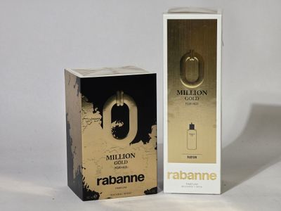 two boxes of perfume sitting next to each other on a white surface