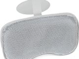 the back of a white head rester with a button on it