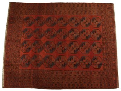 un tapis orange et noir orné d'un motif