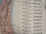 an old map of a city with chinese writing on it