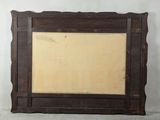 a picture of a wooden frame with a picture on it
