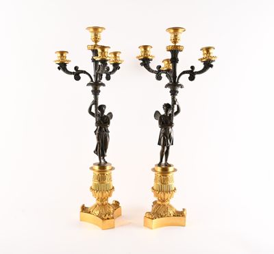 pair of antique bronze candlesticks with cherenshes and cherenshes