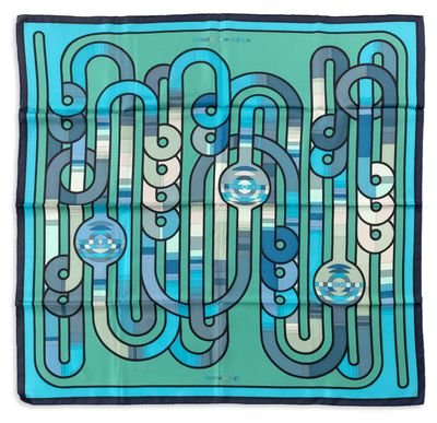 une écharpe bleue et verte avec des cercles, encore et encore