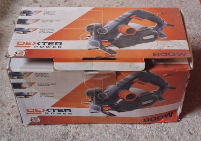 boxed box of power tools sitting on the floor on the floor