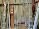 many pieces of metal that are stacked up in a room