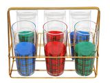 four glasses in a gold holder on a white background
