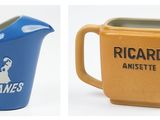 two mugs with different designs on them, one is blue and the other is yellow
