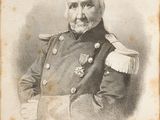 an old picture of a man in a military uniform posing for a picture