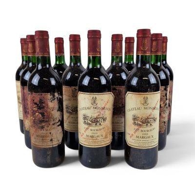 six bottles of wine are lined up in a row on a white surface