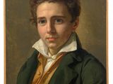 portrait of a young man in a green coat by person