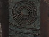 an image of a close up of a metal object with a circular design