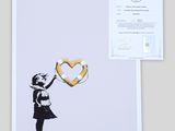 a girl holding a heart shaped balloon in front of a white background