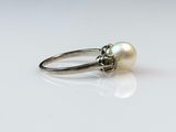 sterling silver ring with a pearl and a skull