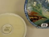 a bowl and a plate on a table with a price tag