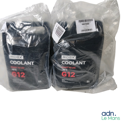 two bags of coolant next to each other on a white surface