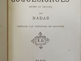 an open book with a black and white image of the title of a novel