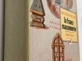 a book on the wall with a clock on it
