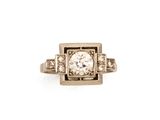 une image d'une bague en diamant sur fond blanc