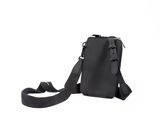 a small black bag with a strap on the shoulder