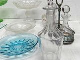 a table with a lot of glass items on it
