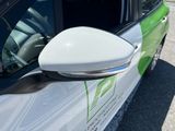 a close up of a car ' s side mirror on the side of the car