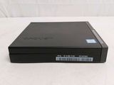 an open dvd player sitting on top of a white surface