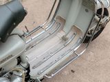 a scooter that is sitting on the ground