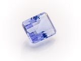 a blue sapphire stone on a white background