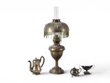 a small lamp and a teapot next to a teapot
