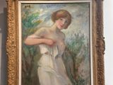 un tableau représentant une femme en robe blanche accroché au mur