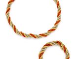 two bracelets and a bracelet with a rope on a white background