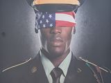une affiche représentant un homme en uniforme militaire, le visage dissimulé par un drapeau américain