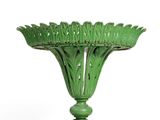 an image of a green vase on a stand on a white background