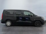 a picture of a black van parked in a parking lot