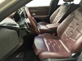 a car with two leather seats in the back of it