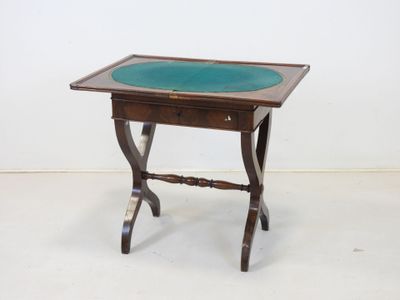 an image of a small table with a glass top on a white floor
