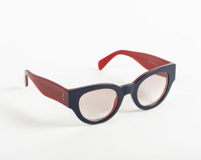 sunglasses with red and blue frames on a white background